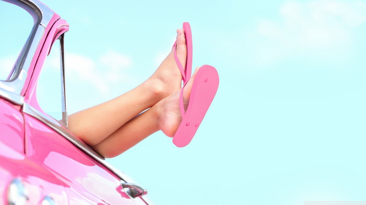 woman in pink flip flops