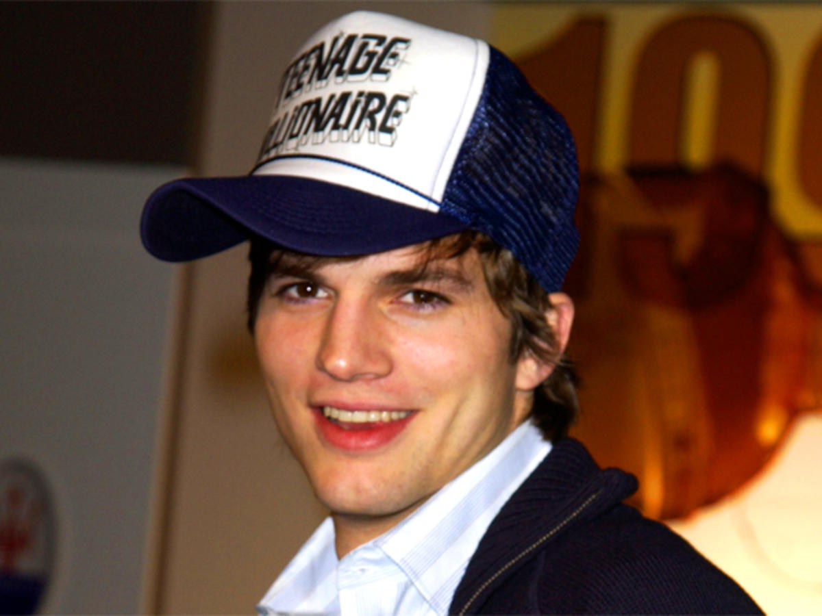 ashton kutcher wearing a trucker hat