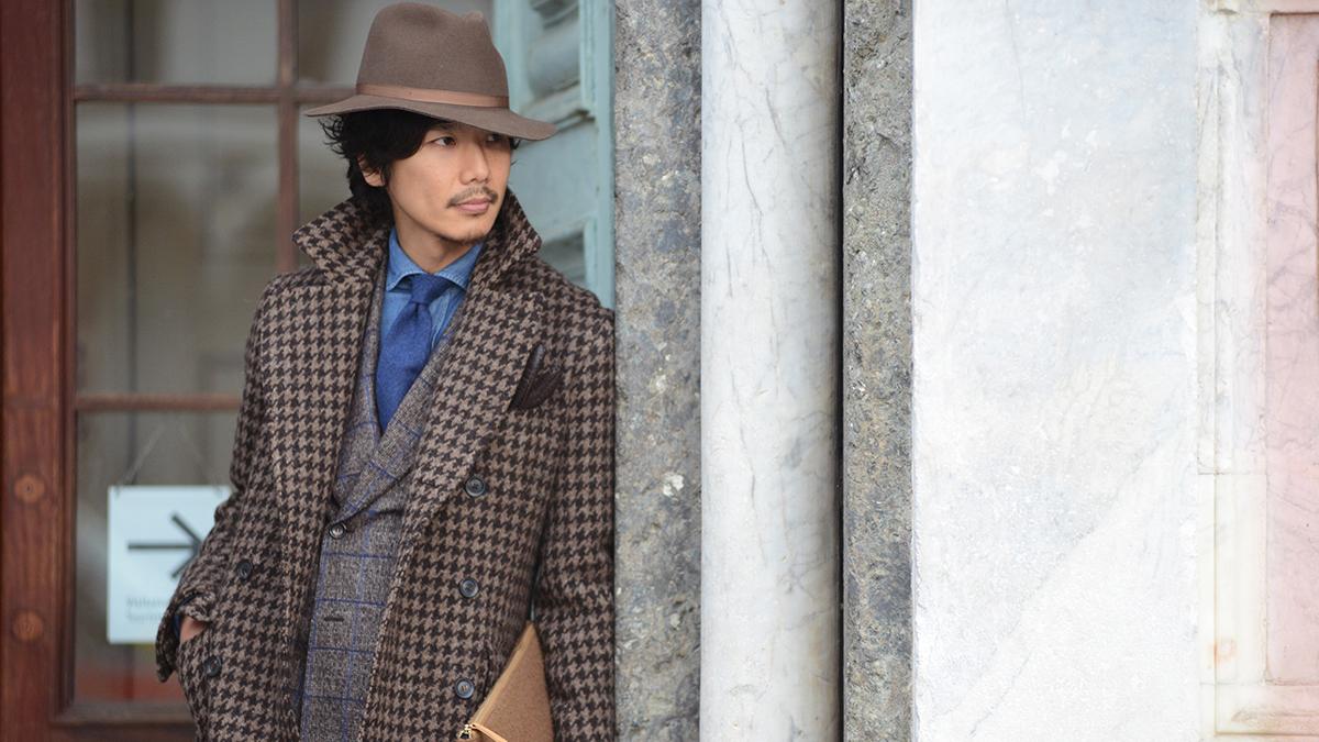 man wearing a suit and fedora combination