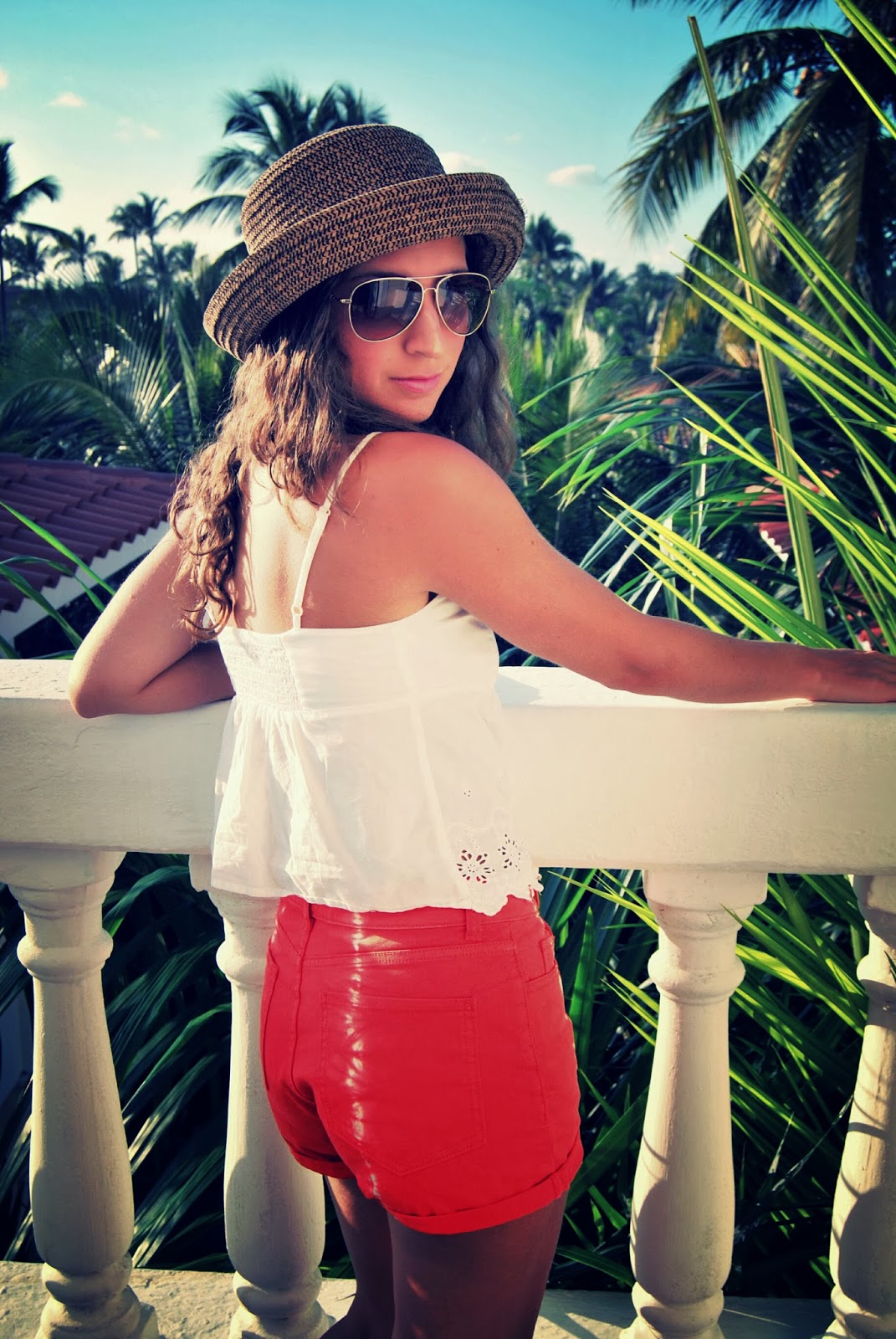 a girl wearing a cute orange shorts
