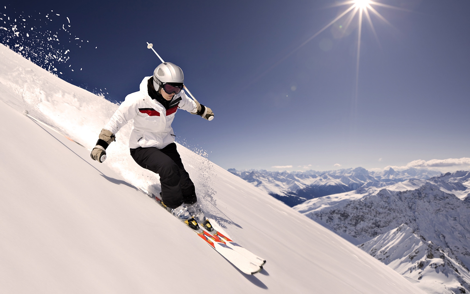 a woman skiing downhill