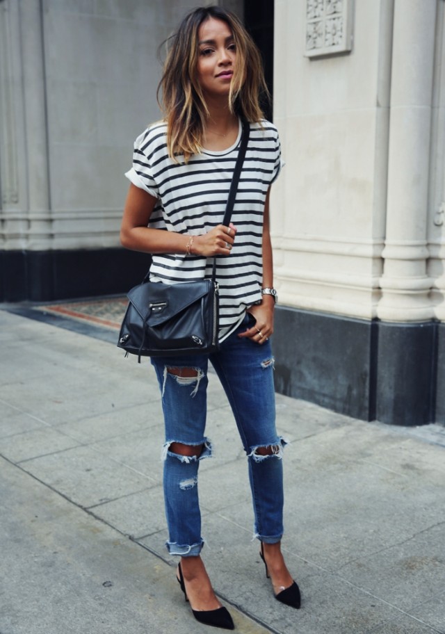 a girl wearing striped outfit