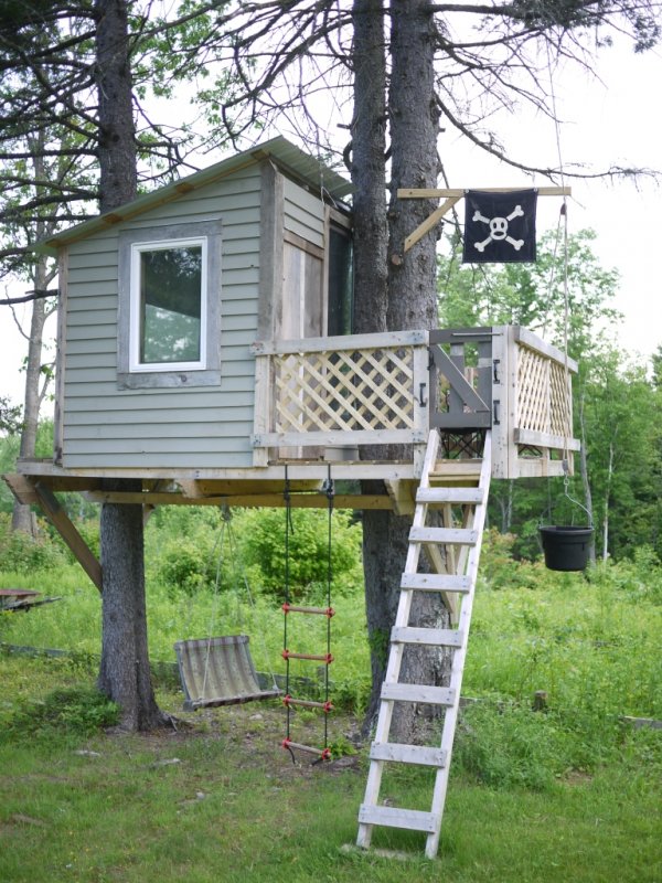 treehouse with a pirate flag