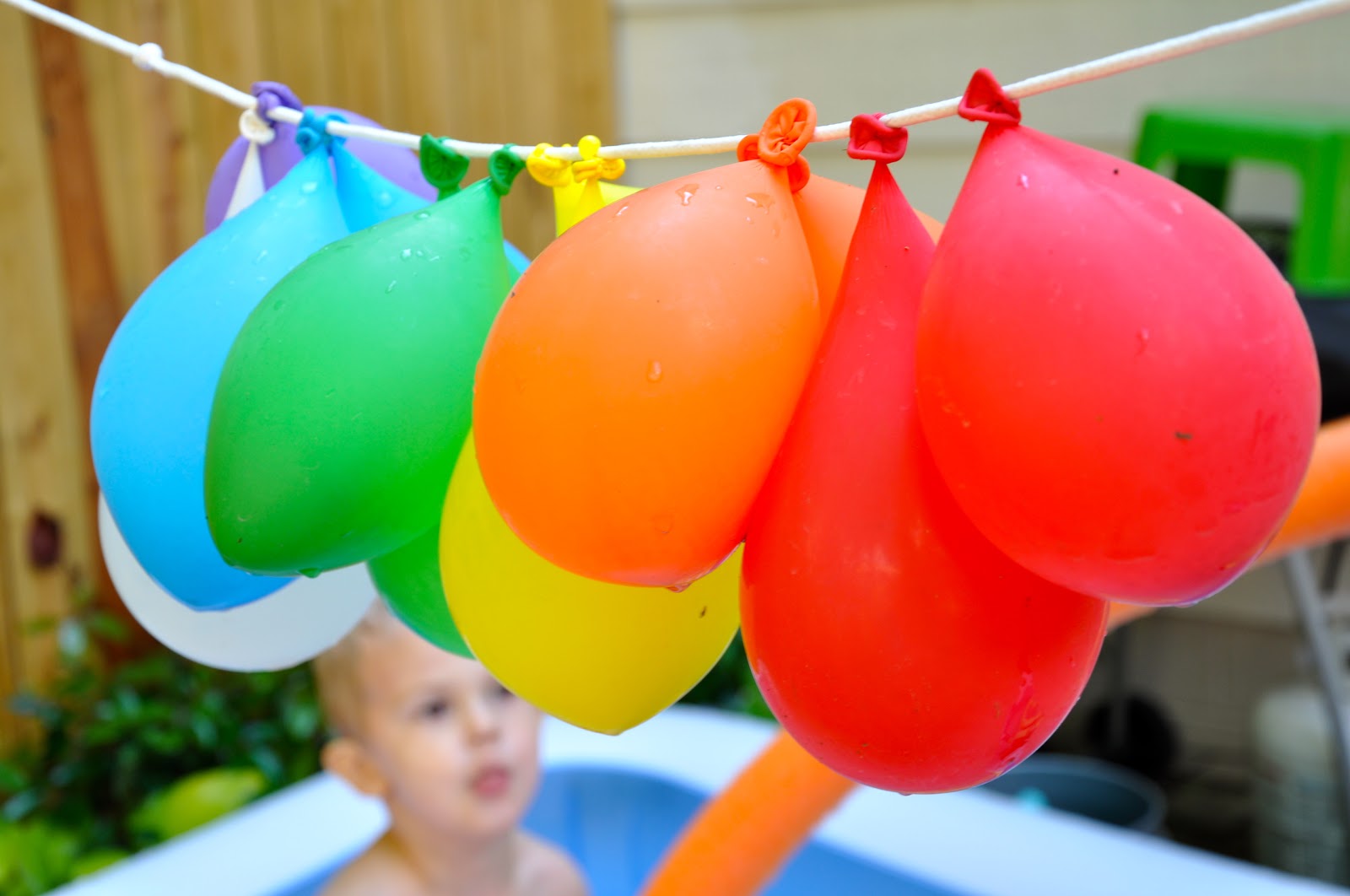 water ballons hanging on a string
